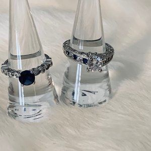 Two Silver Tone Fashion Rings with Blue and Clear Stone Round